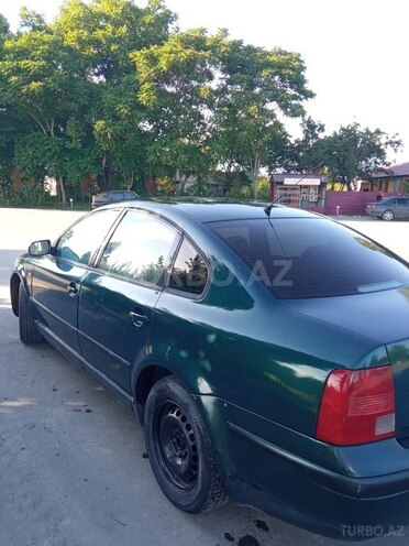 Volkswagen Passat 1997, 300,000 km - 1.8 l - Qax