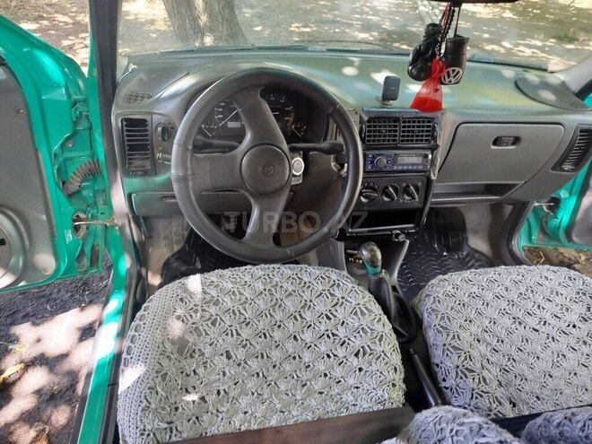 Volkswagen Polo 1996, 162,903 km - 1.6 l - Qax
