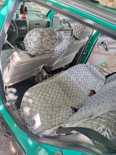 Volkswagen Polo 1996, 162,903 km - 1.6 l - Qax