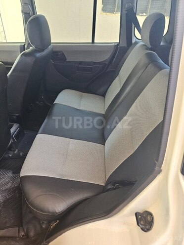 Mitsubishi Pajero io 2001, 215,000 km - 2.0 l - Bakı