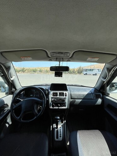 Mitsubishi Pajero io 1999, 250,000 km - 2.0 l - Bakı