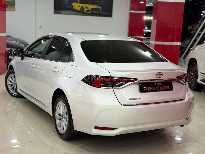 Toyota Corolla 2022, 100,000 km - 1.6 l - Bakı