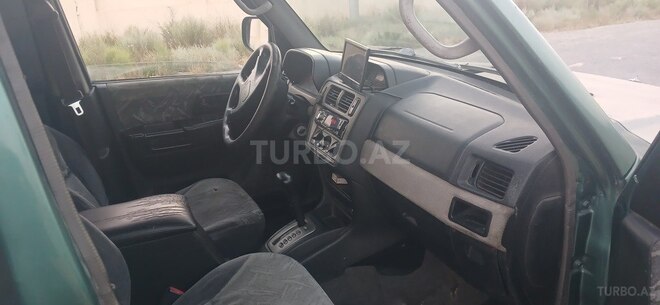 Mitsubishi Pajero io 1999, 234,123 km - 1.8 l - Bakı