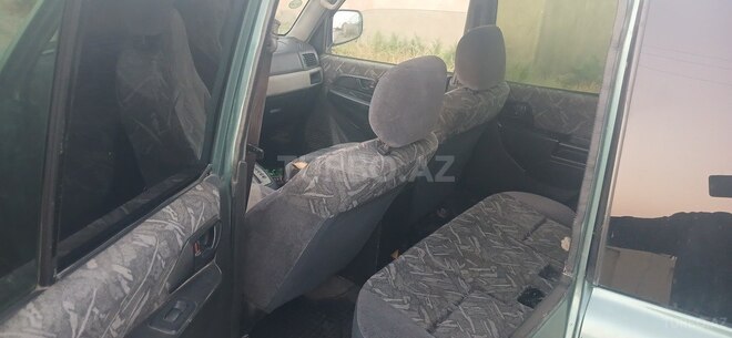 Mitsubishi Pajero io 1999, 234,123 km - 1.8 l - Bakı