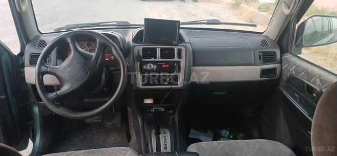 Mitsubishi Pajero io 1999, 234,123 km - 1.8 l - Bakı