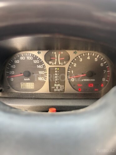 Mitsubishi Pajero io 1999, 300,000 km - 1.8 l - Bakı