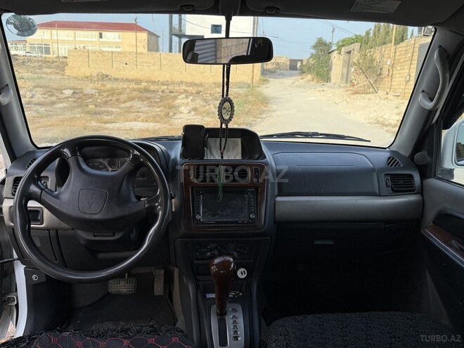 Mitsubishi Pajero io 1999, 300,000 km - 1.8 l - Bakı