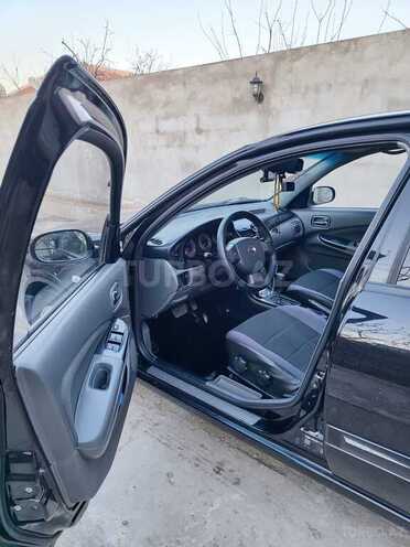 Nissan Sunny 2010, 276,000 km - 1.6 l - Bakı