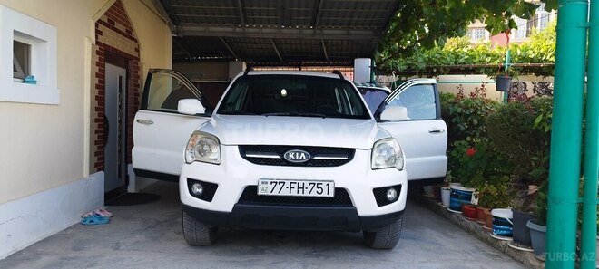 Kia Sportage 2009, 246,000 km - 2.0 l - Bakı
