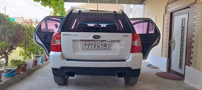 Kia Sportage 2009, 246,000 km - 2.0 l - Bakı
