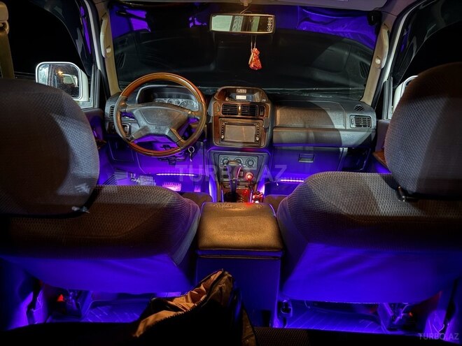 Mitsubishi Pajero io 2000, 300,000 km - 2.0 l - Quba