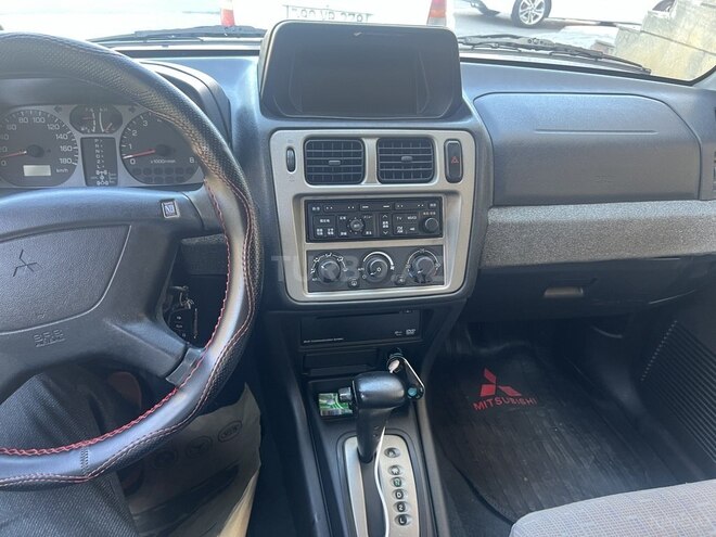 Mitsubishi Pajero io 2003, 260,000 km - 1.8 l - Bakı
