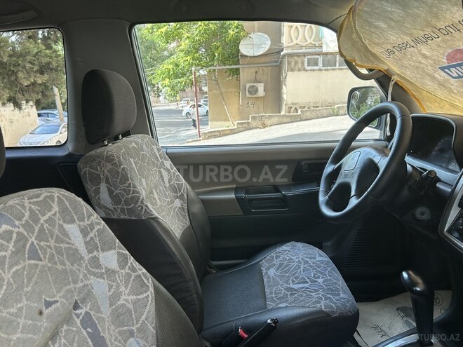 Mitsubishi Pajero io 1999, 194,000 km - 1.8 л - Bakı