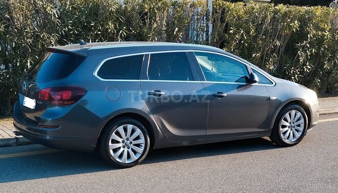Opel Astra 2011, 199,000 km - 1.4 л - Bakı