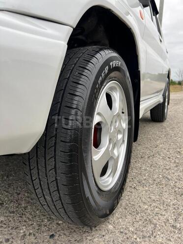 Mitsubishi Pajero io 2001, 100,000 km - 1.8 l - Quba