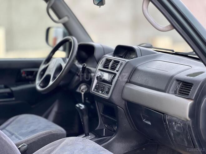 Mitsubishi Pajero io 2002, 322,000 km - 2.0 л - Sumqayıt