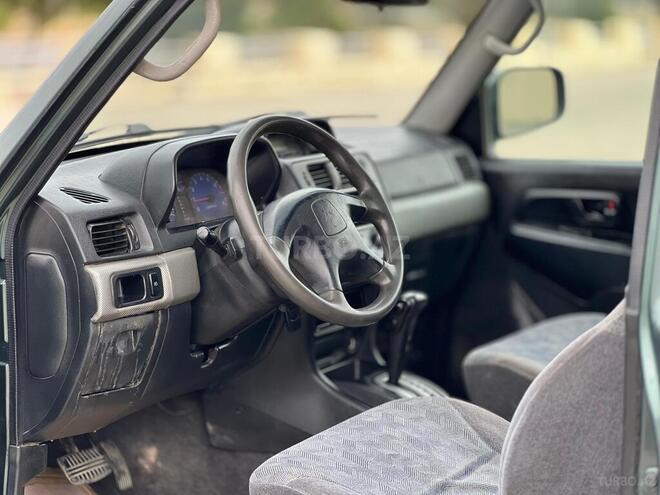 Mitsubishi Pajero io 2002, 322,000 km - 2.0 л - Sumqayıt