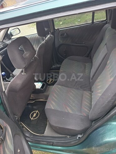 Opel Astra 1996, 250,000 km - 1.6 l - Quba