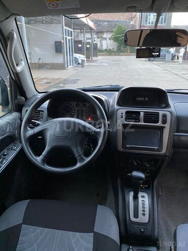Mitsubishi Pajero io 1998, 230,000 km - 1.8 л - Quba