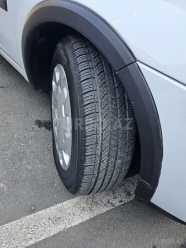 Opel Combo 2010, 202,000 km - 1.3 л - Bakı