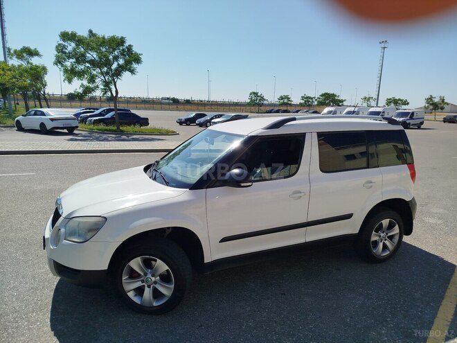 Skoda Yeti 2012, 242,246 km - 1.2 l - Bakı