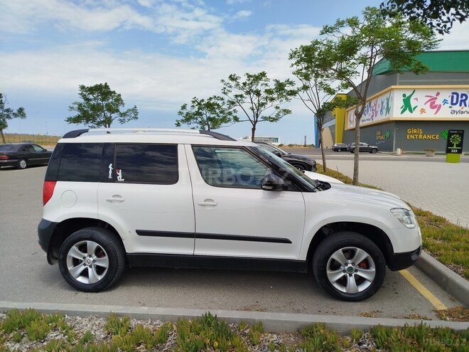 Skoda Yeti 2012, 242,246 km - 1.2 l - Bakı
