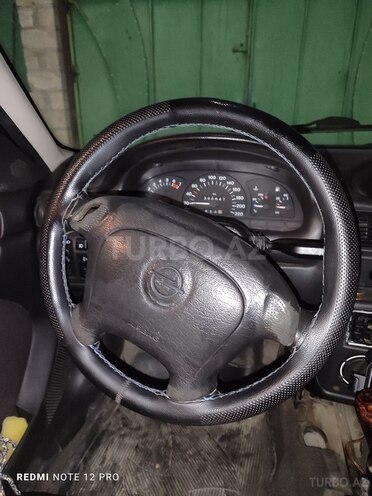 Opel Astra 1997, 396,000 km - 1.4 l - Qusar