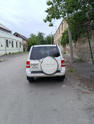 Mitsubishi Pajero io 2003, 218,695 km - 2.0 л - Gəncə