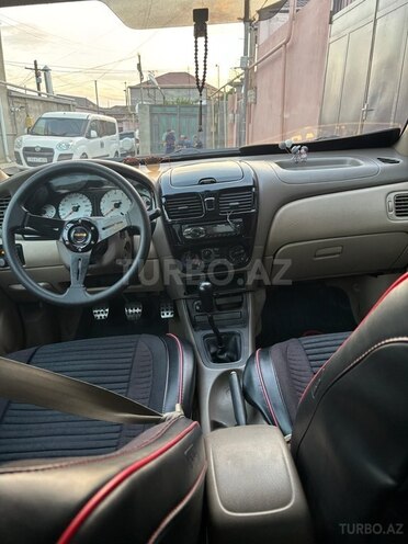 Nissan Sunny 2006, 390,000 km - 1.3 l - Bakı
