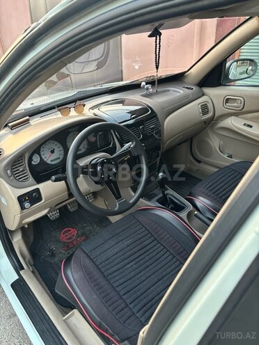 Nissan Sunny 2006, 390,000 km - 1.3 l - Bakı