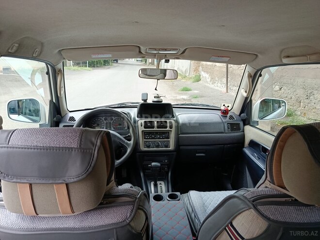 Mitsubishi Pajero io 2003, 218,695 km - 2.0 л - Gəncə