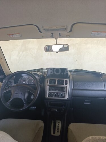 Mitsubishi Pajero io 2003, 237,377 km - 2.0 l - Bakı