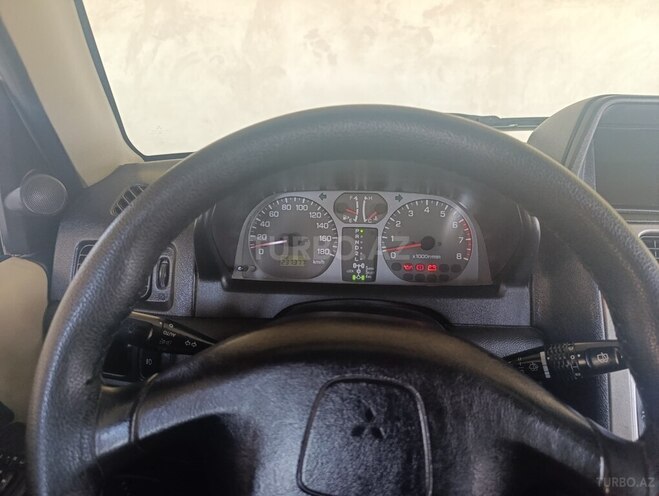 Mitsubishi Pajero io 2003, 237,377 km - 2.0 l - Bakı