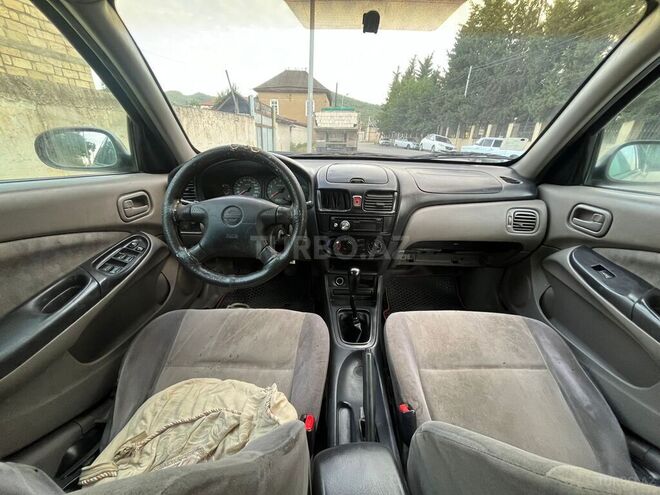 Nissan Sunny 2003, 342,000 km - 1.6 l - Quba