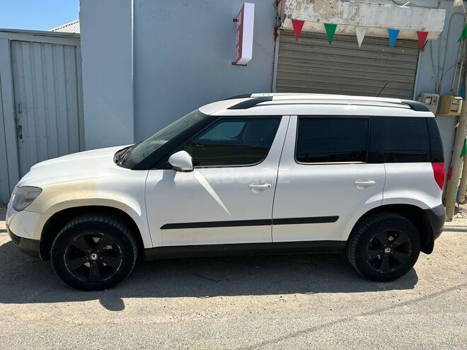 Skoda Yeti 2011, 330,000 km - 1.2 l - Bakı