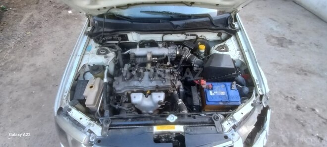 Nissan Sunny 2006, 250,000 km - 1.6 l - Bakı
