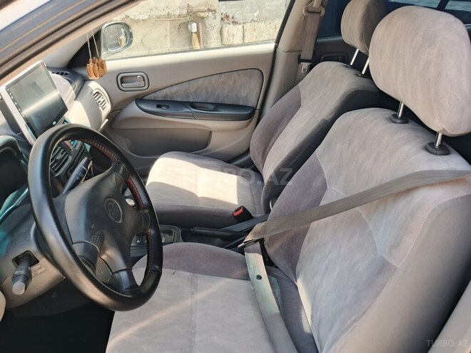 Nissan Sunny 2003, 303,000 km - 1.6 l - Bakı