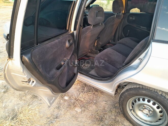 Opel Astra 1997, 477,904 km - 1.6 l - Quba