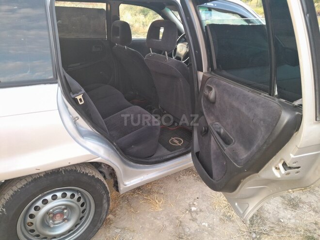 Opel Astra 1997, 477,904 km - 1.6 l - Quba