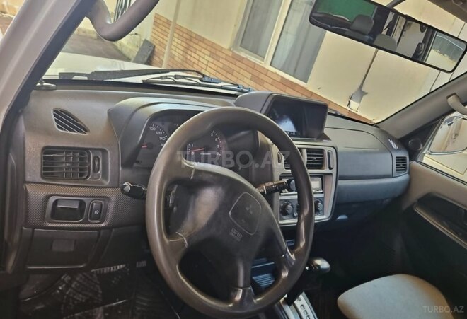 Mitsubishi Pajero io 2001, 215,000 km - 2.0 l - Bakı