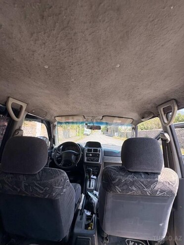 Mitsubishi Pajero io 1998, 460,000 km - 1.8 л - Qax