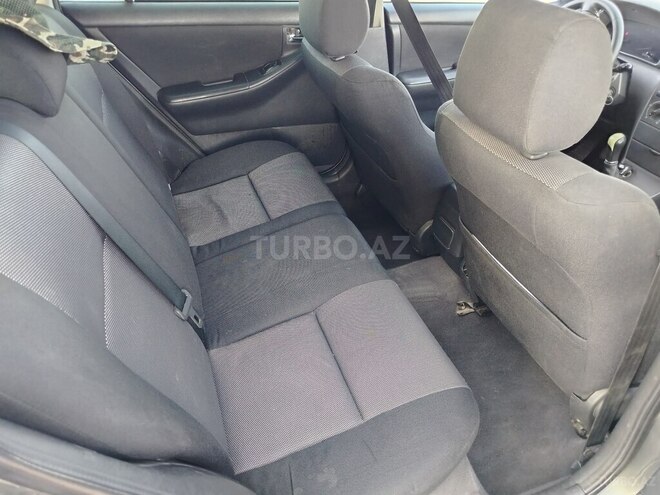 Toyota Corolla 2006, 318,893 km - 1.4 l - Yevlax