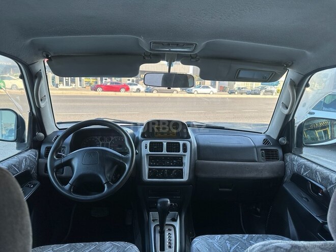 Mitsubishi Pajero io 1999, 326,000 km - 1.8 л - Bakı