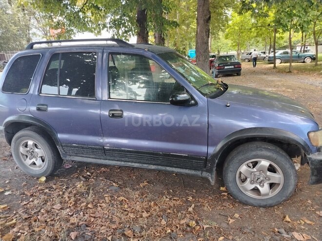 Kia Sportage 2000, 199,678 km - 2.0 l - Qax