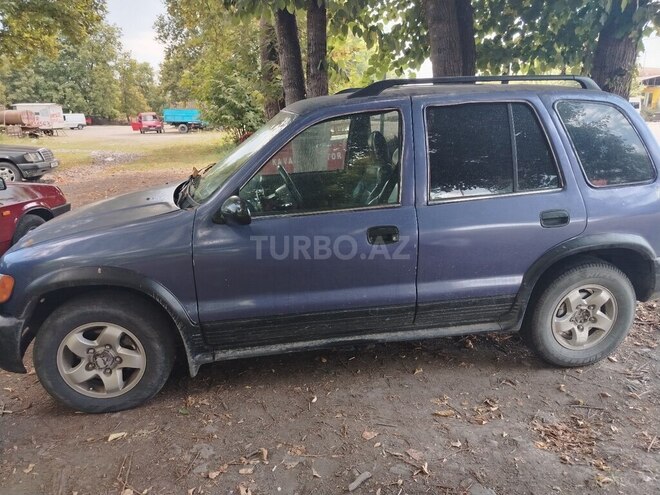 Kia Sportage 2000, 199,678 km - 2.0 l - Qax