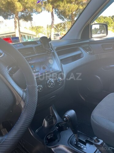 Kia Sportage 2009, 240,000 km - 2.0 л - Bakı