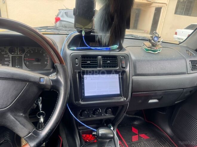 Mitsubishi Pajero io 2001, 265,000 km - 1.8 л - Bakı