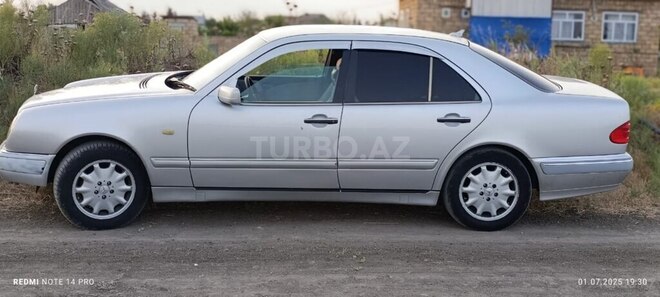 Mercedes E 230 1999, 1,000 km - 2.3 l - Masallı