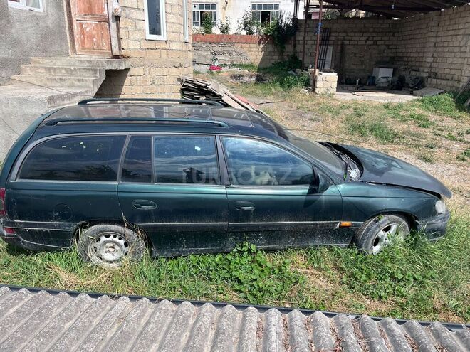 Opel Omega 1994, 182,000 km - 2.0 l - Qusar
