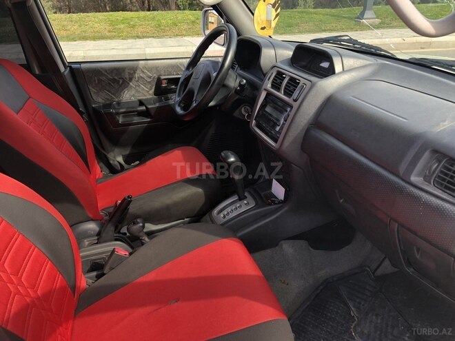 Mitsubishi Pajero io 1999, 400,000 km - 1.8 l - Bakı